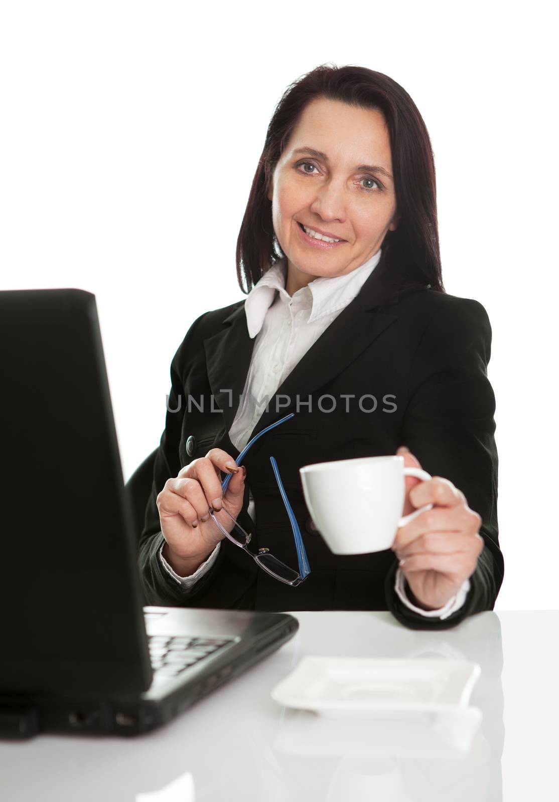 Beautiful business woman drinking coffee. Isolated on white