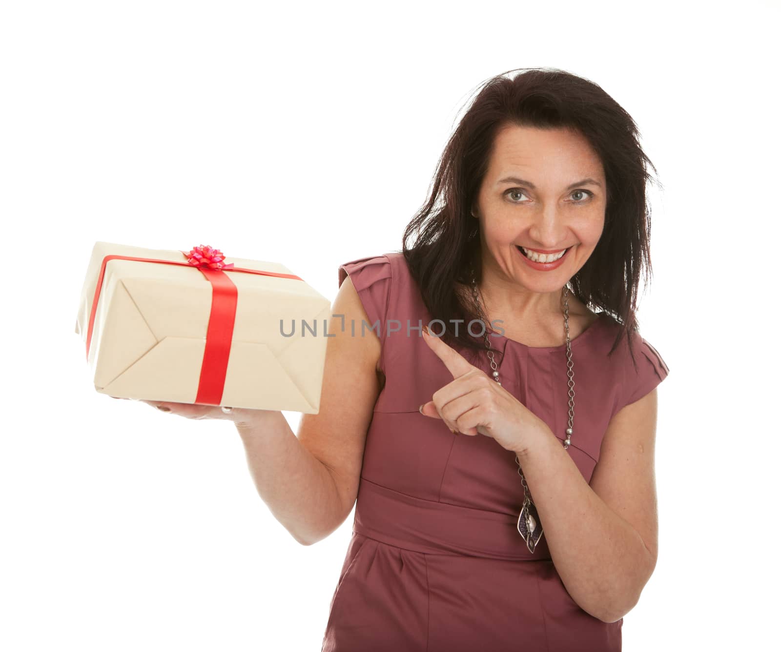 Happy woman holding gift box. Isolated on white