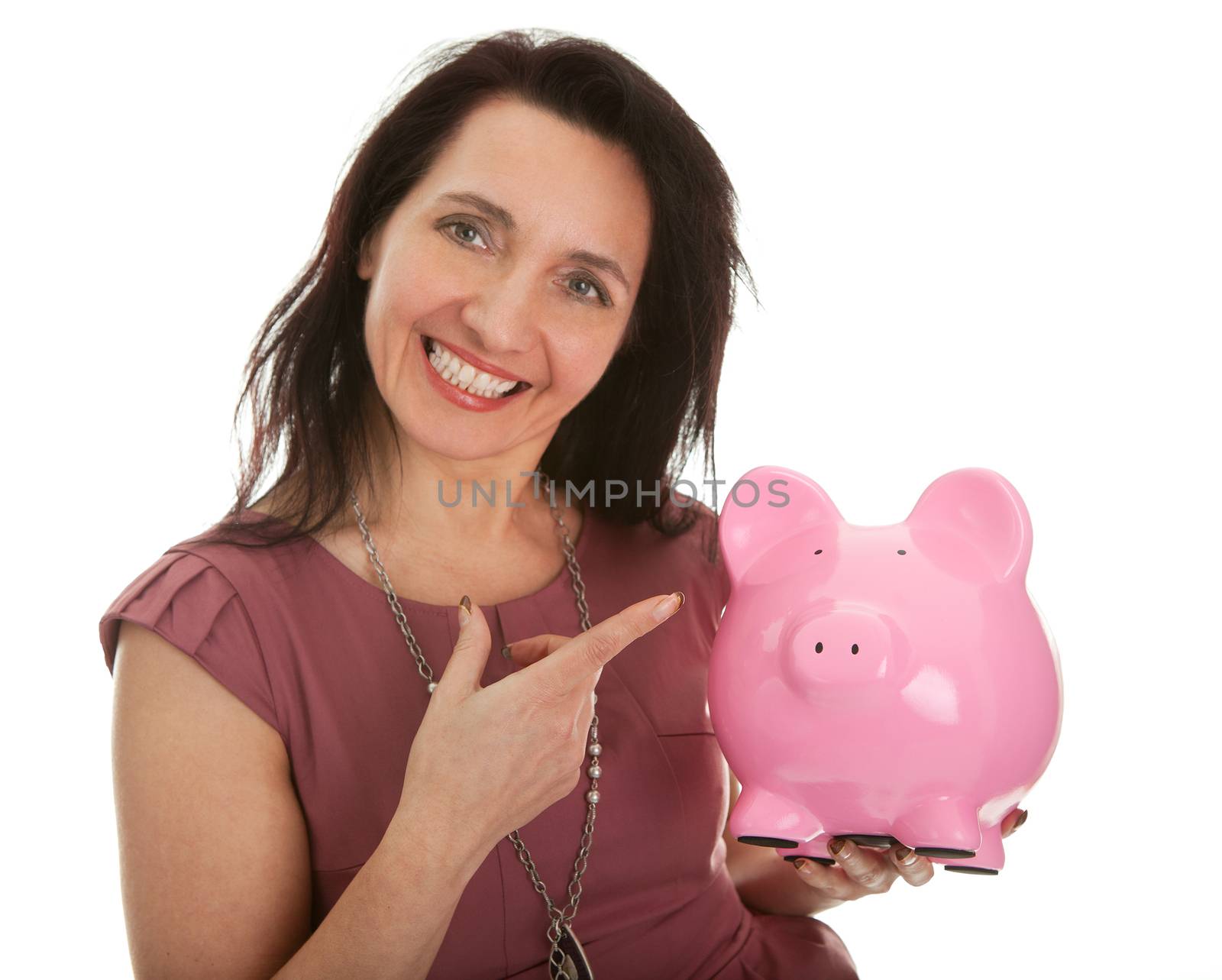 Beautiful woman holding her personal savings in piggy bank. Isolated