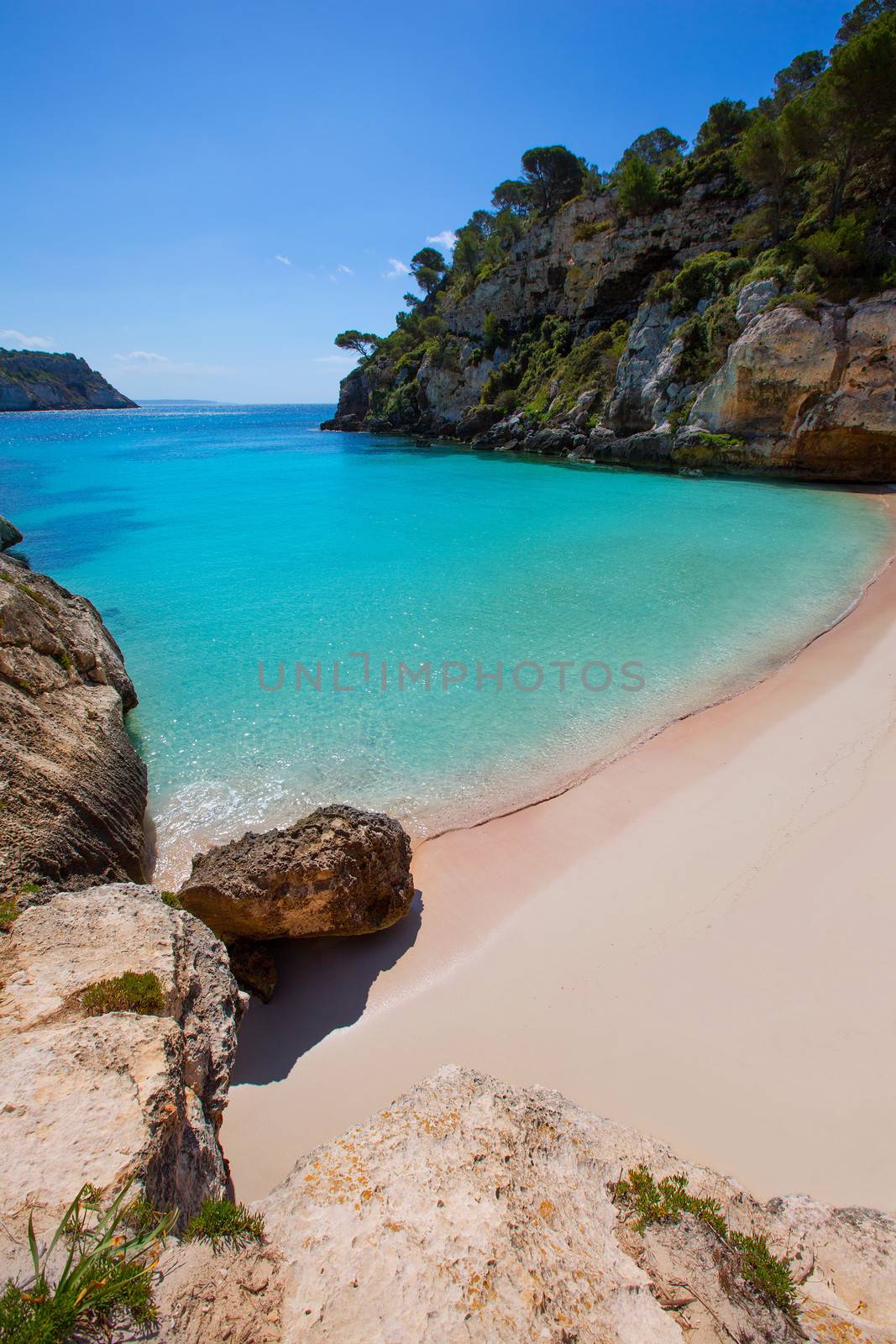 Cala Macarelleta in Ciutadella Menorca at turquoise Balearic Islands Mediterranean sea