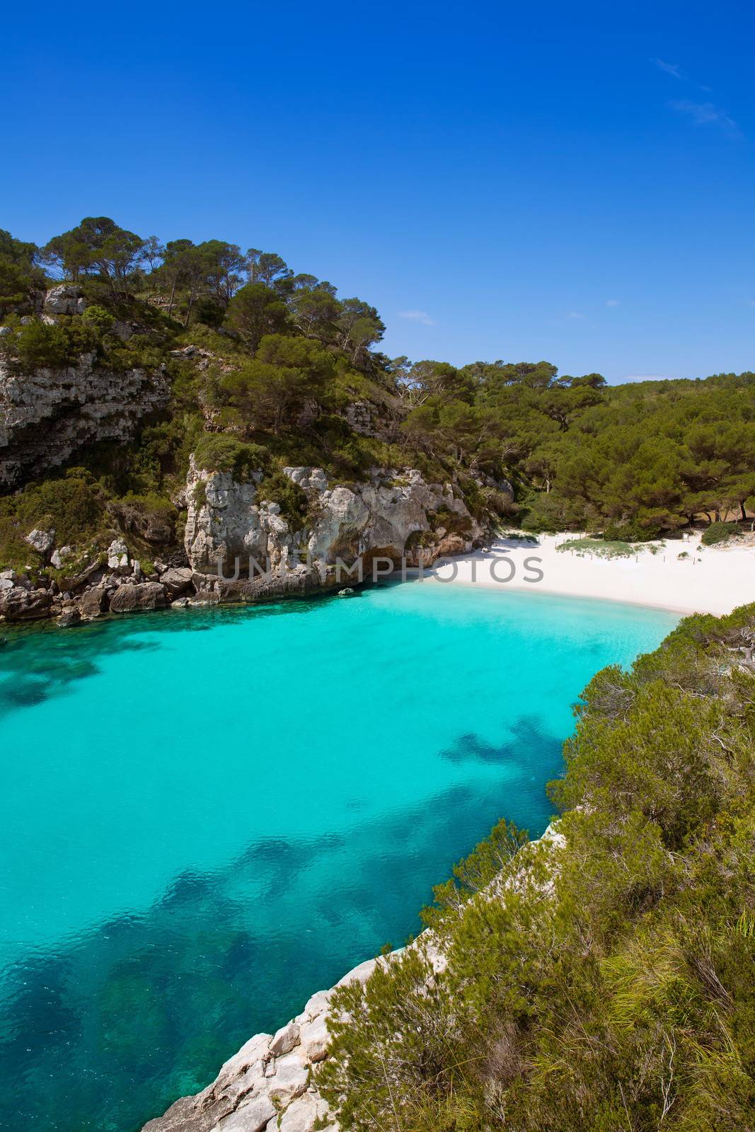 Cala Macarelleta in Ciutadella Menorca at turquoise Balearic Islands Mediterranean sea