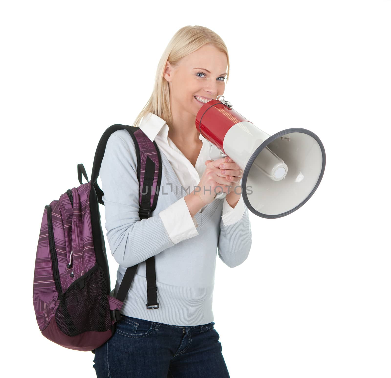 Beautiful student girl shouting in megaphone. Isolated on white