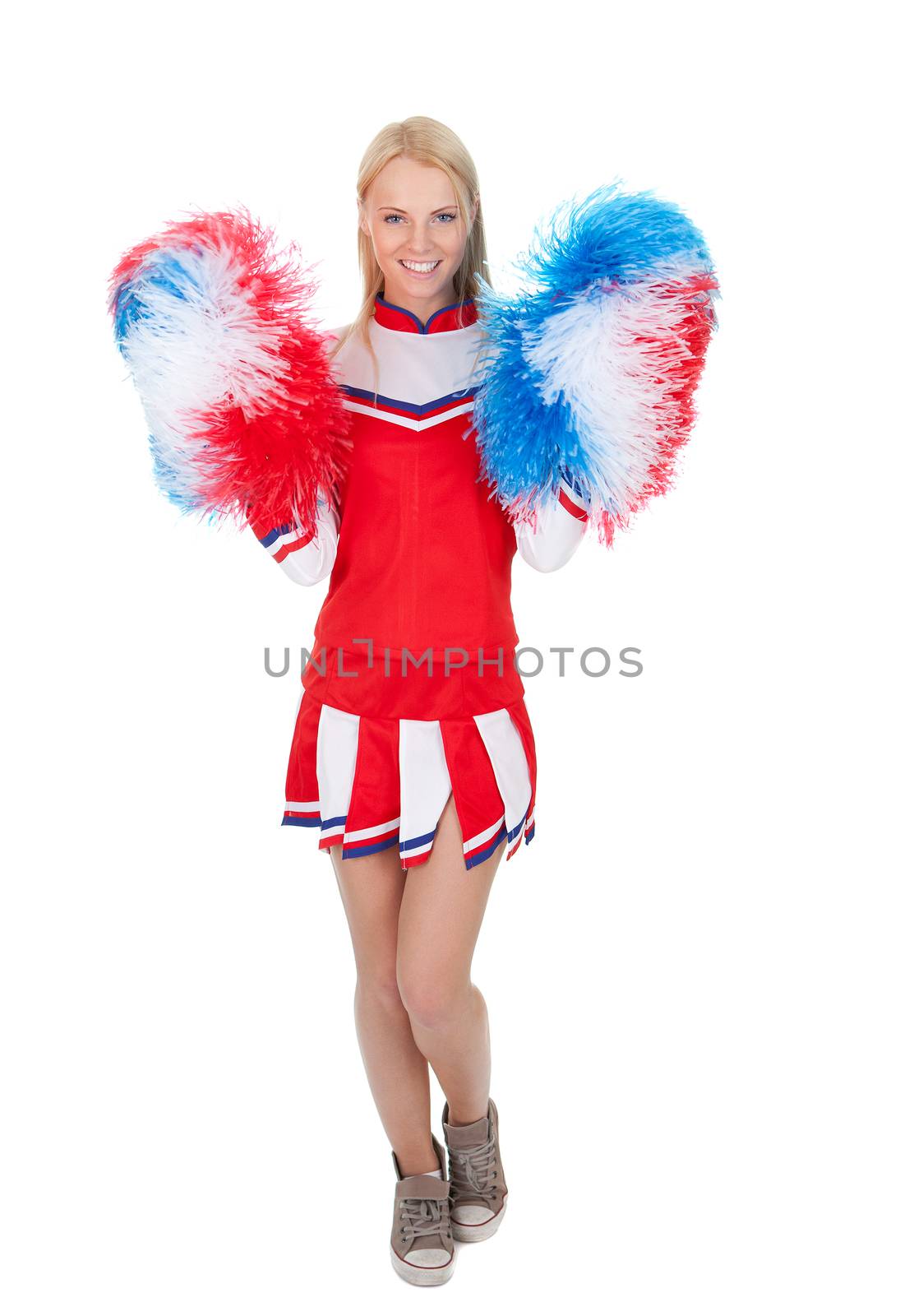 Smiling beautiful cheerleader with pompoms. Isolated on white