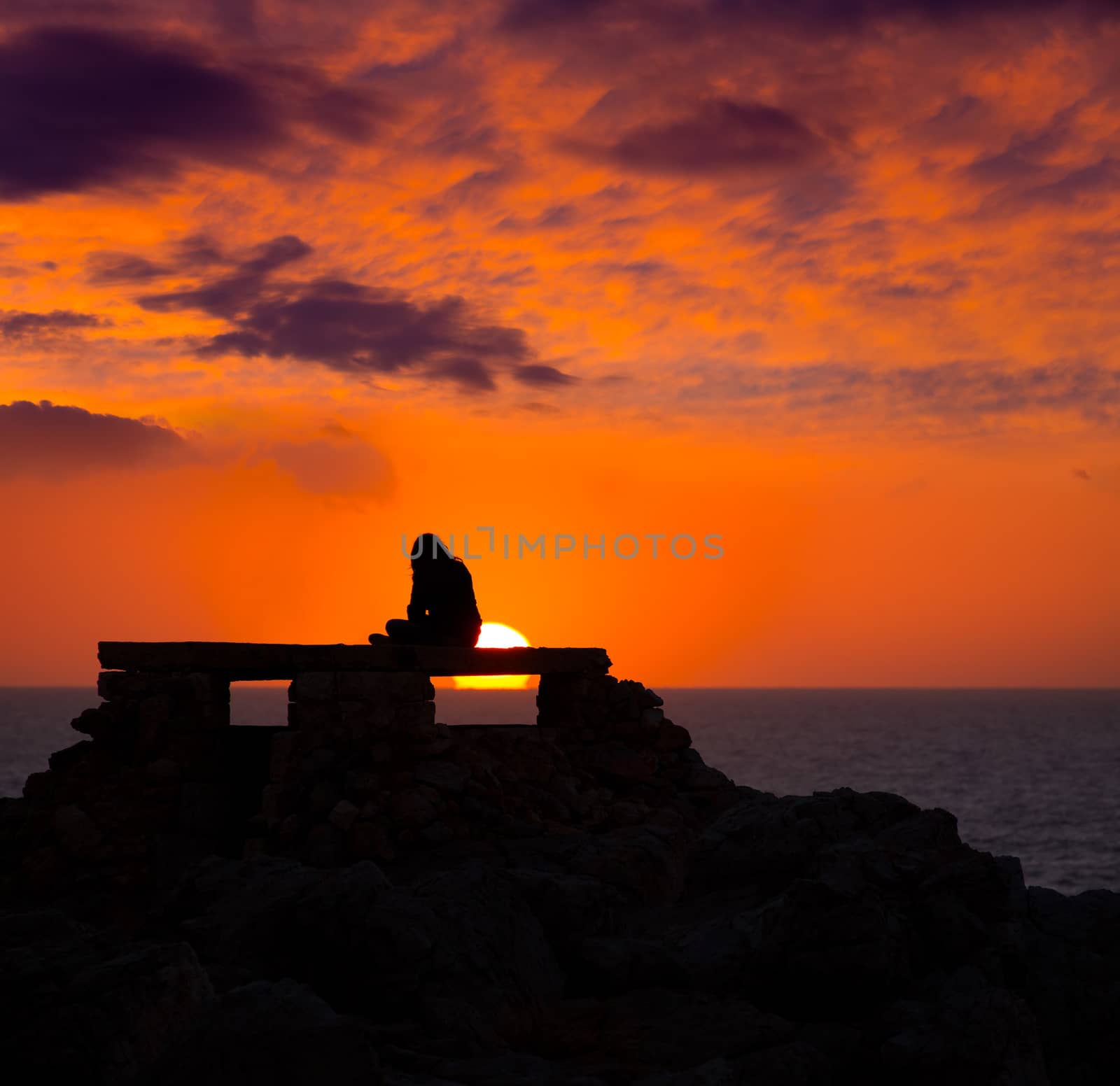 Ciutadella Menorca at Punta Nati sunset with girl by lunamarina