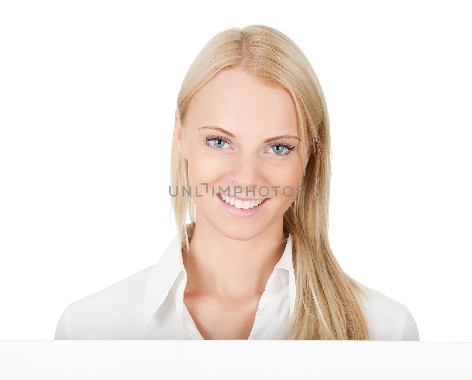 Cheerful businesswomen presenting empty board. Isolated on white
