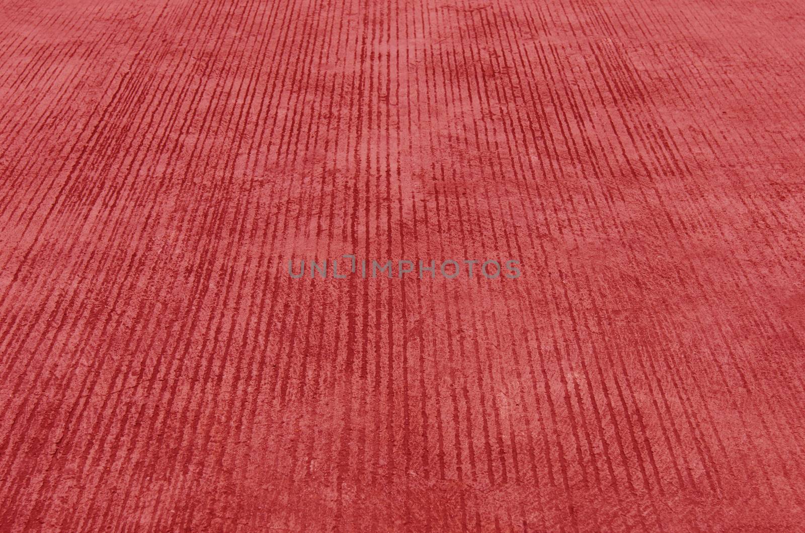 Textured cement background , red concrete sidewalk stone ,