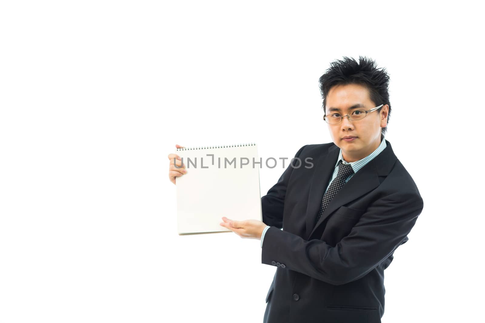 Businessman holding blank book for editing isolated over white background