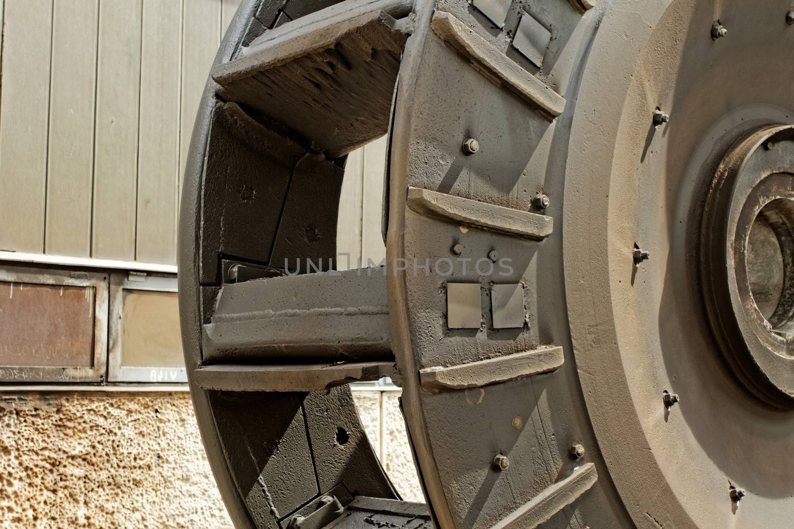 industrial coal mill wheel details (close up) sephia
