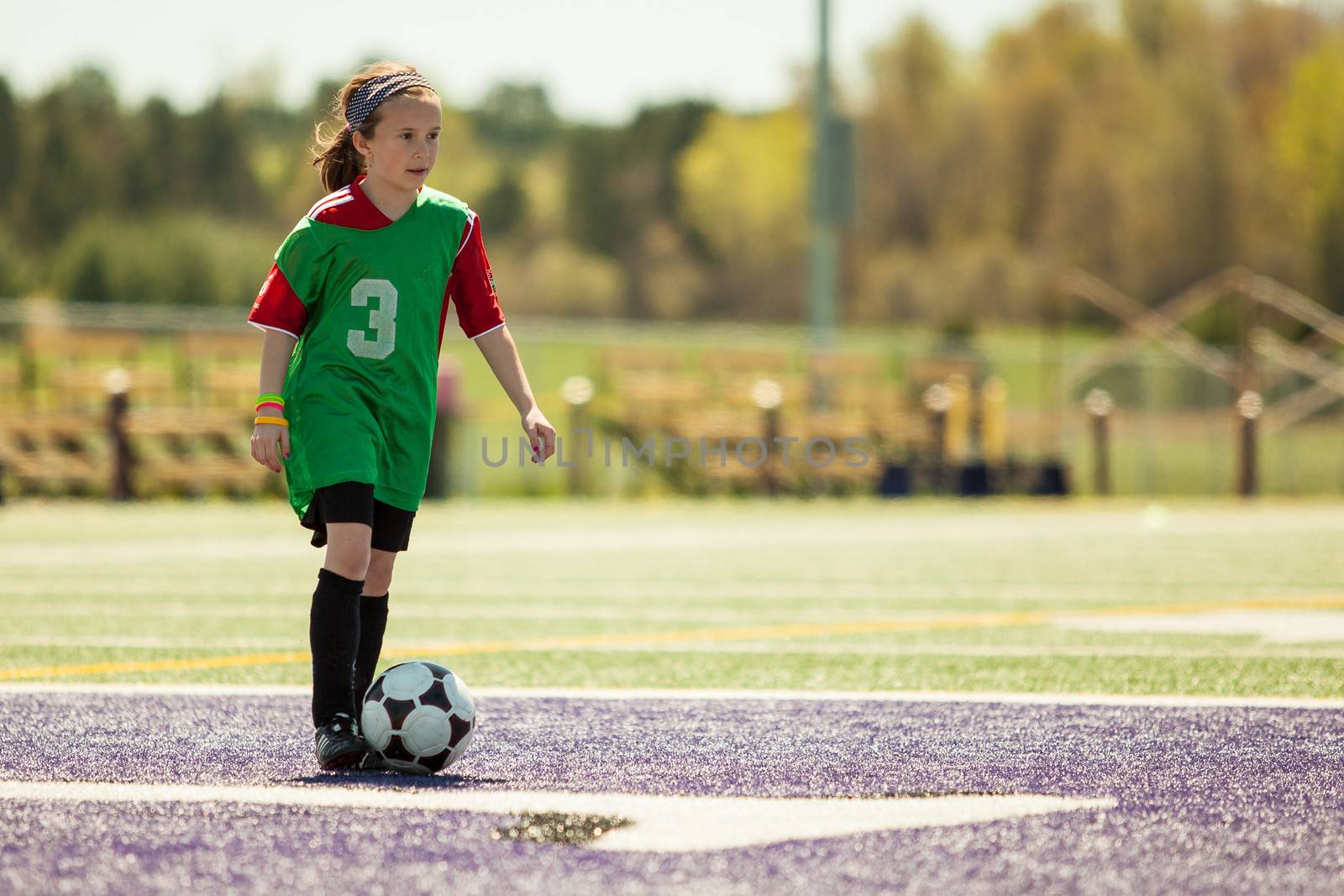 Girl at a soccer practice by Talanis