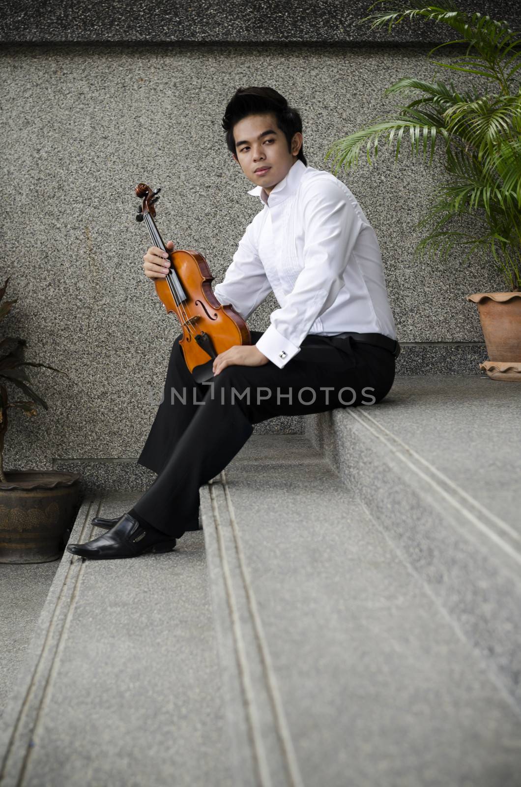 Thailand asia man with his violin he is a soloist