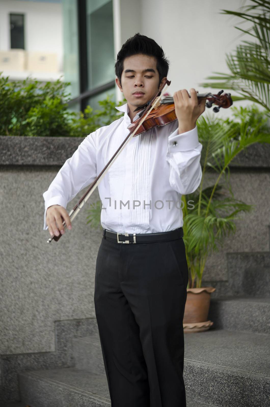 asia man with his violin by ammza12