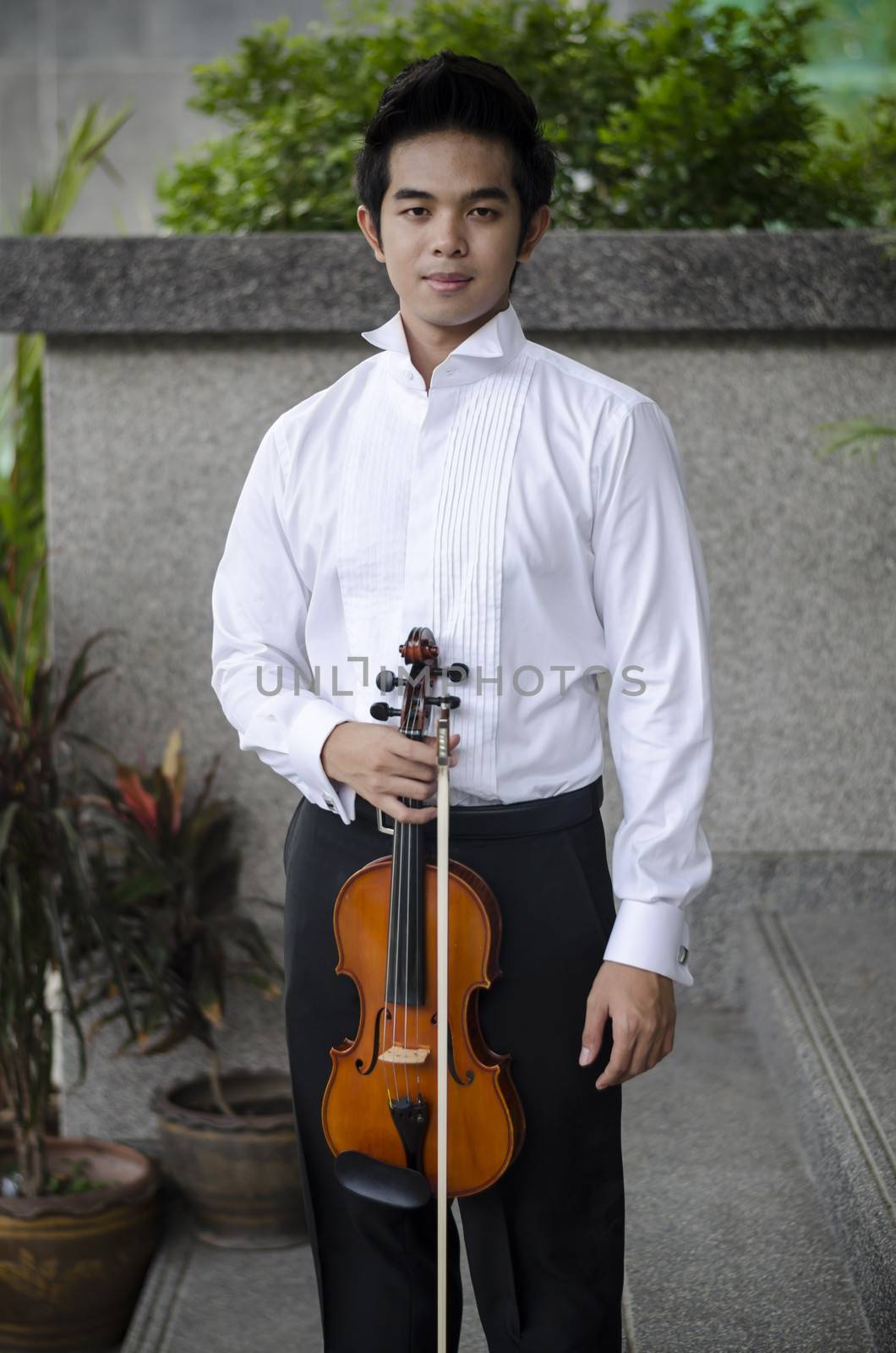 Thailand asia man with his violin he is a soloist