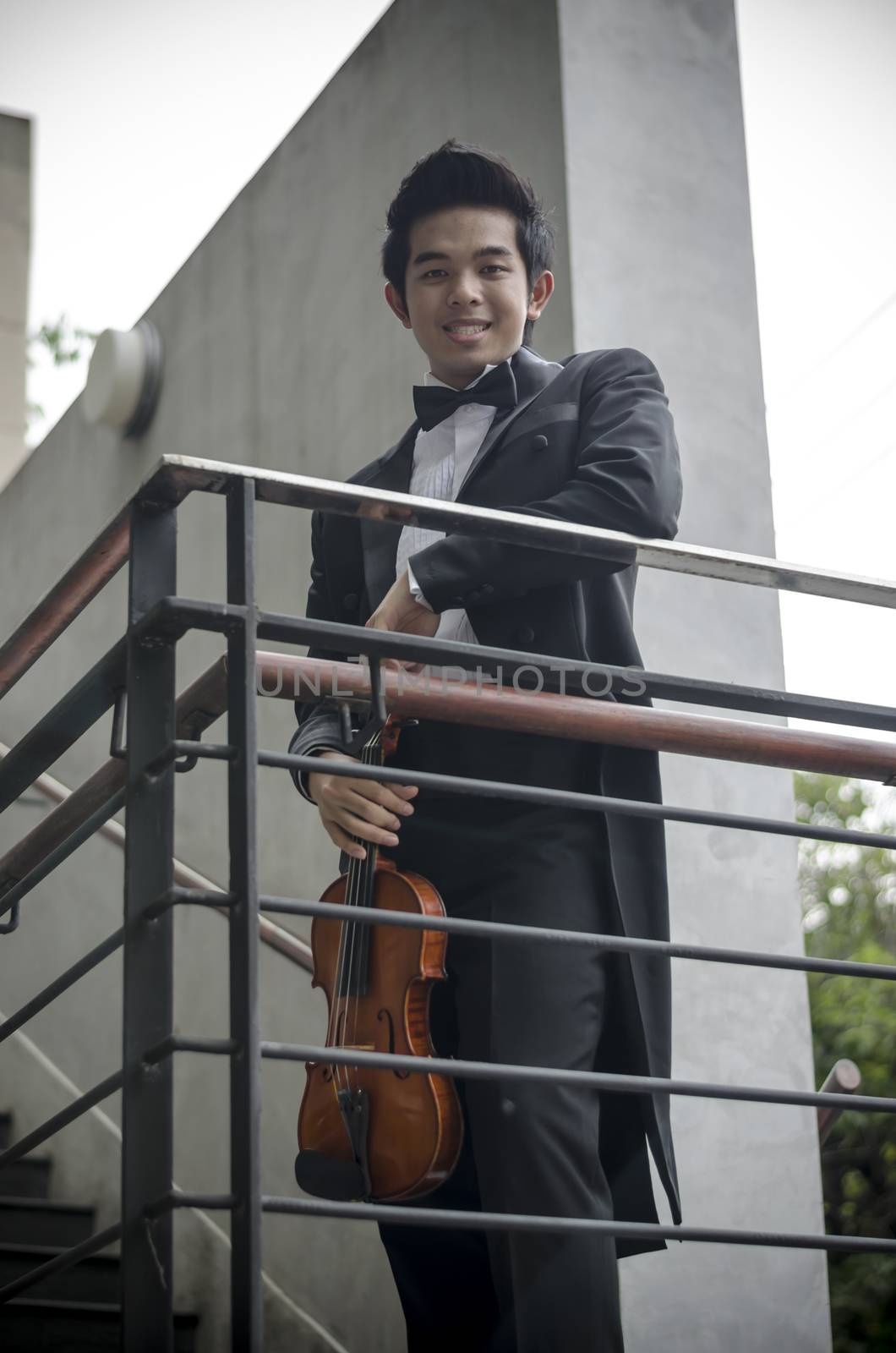 Thailand asia man with his violin he is a soloist