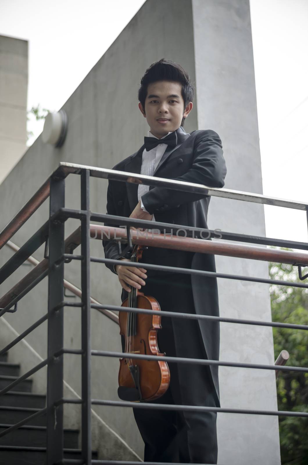 Thailand asia man with his violin he is a soloist