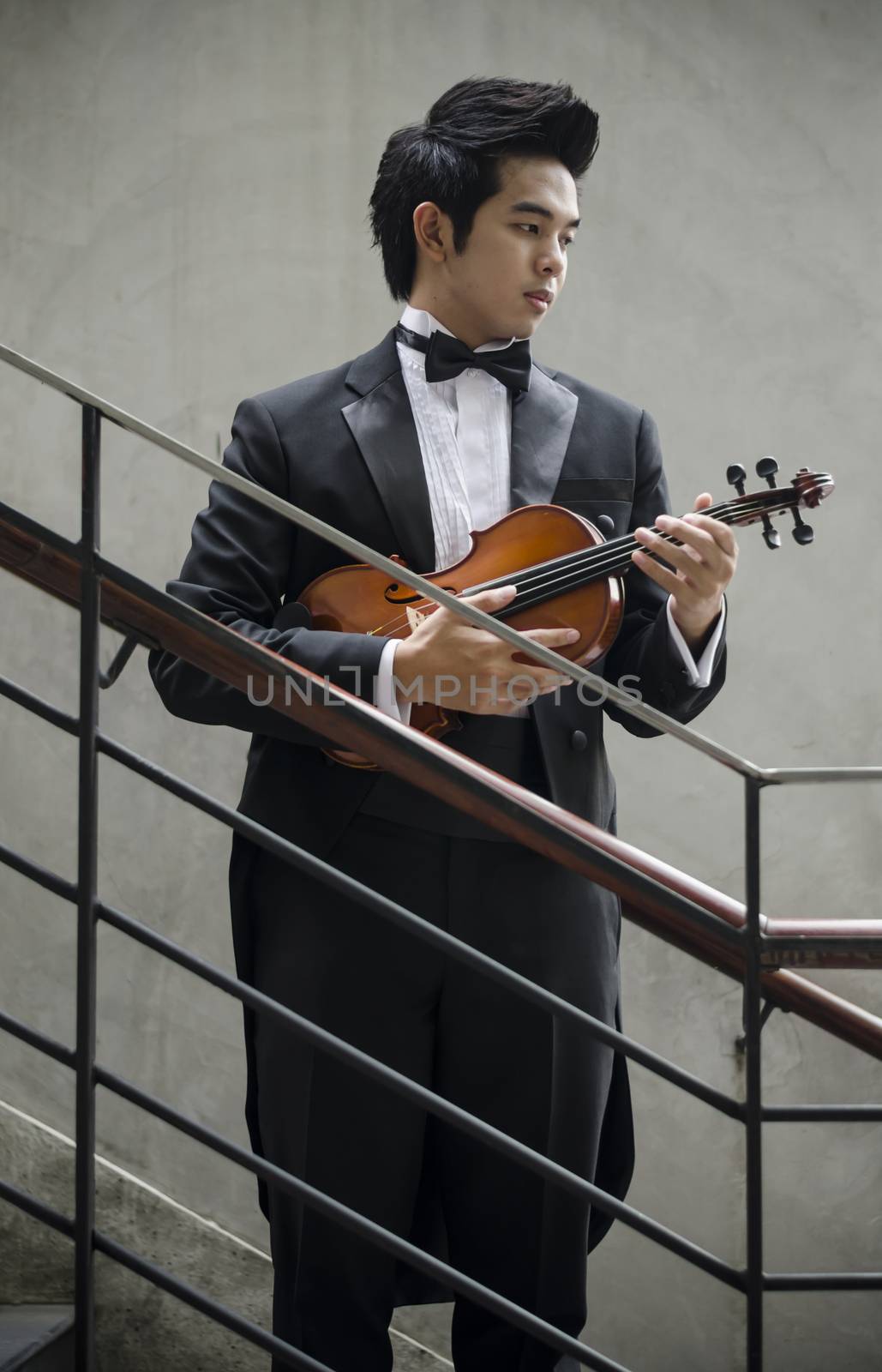 Thailand asia man with his violin he is a soloist