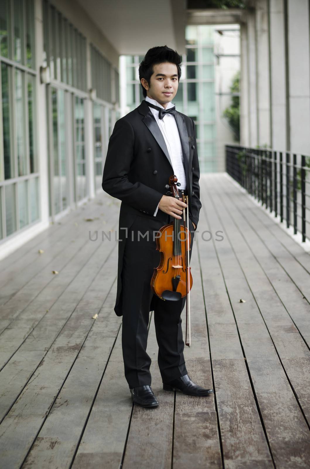 Thailand asia man with his violin he is a soloist