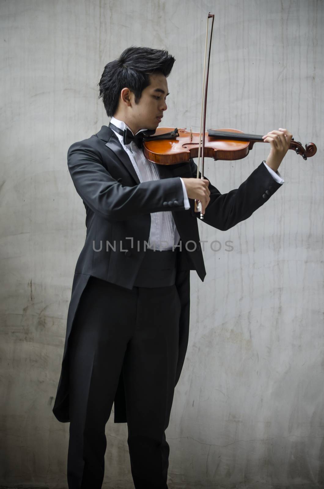 Thailand asia man with his violin he is a soloist