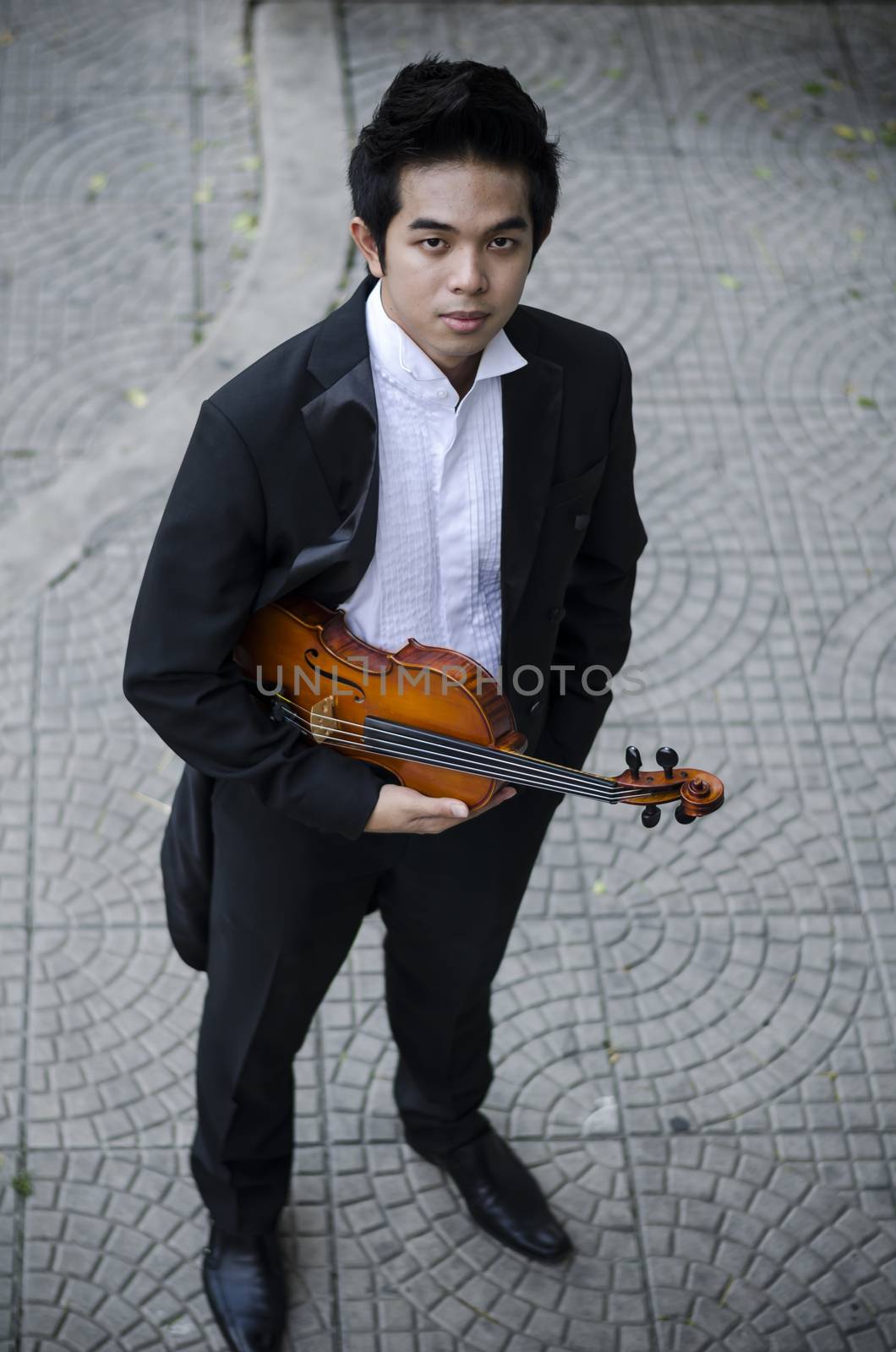 Thailand asia man with his violin he is a soloist