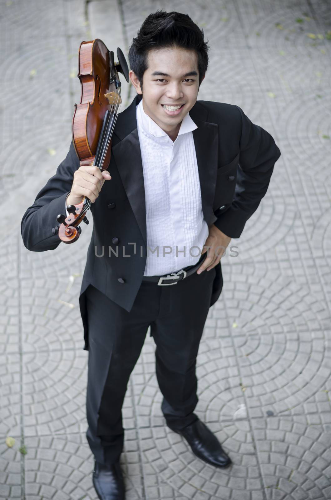 Thailand asia man with his violin he is a soloist
