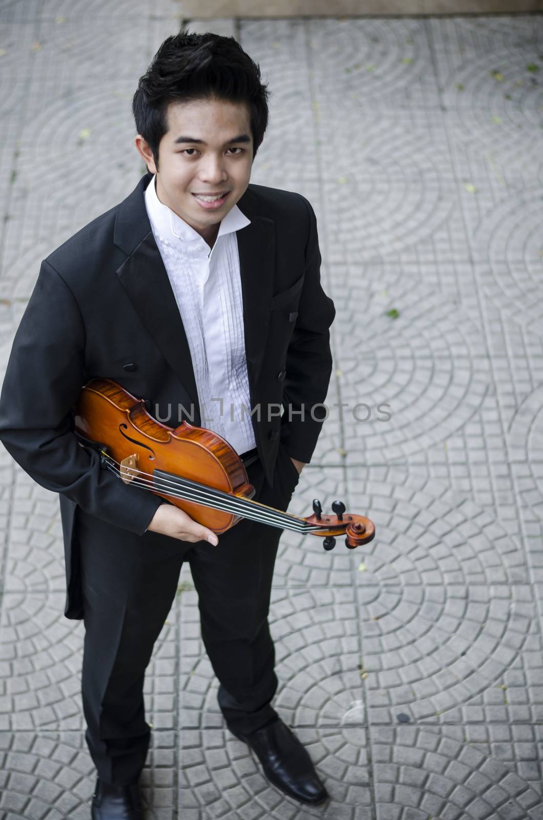 Thailand asia man with his violin he is a soloist