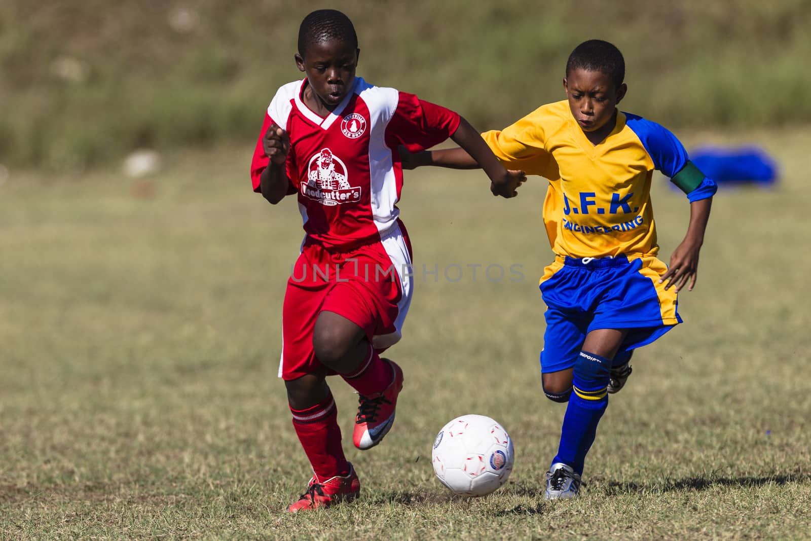 Junior Football Soccer Game by ChrisVanLennepPhoto