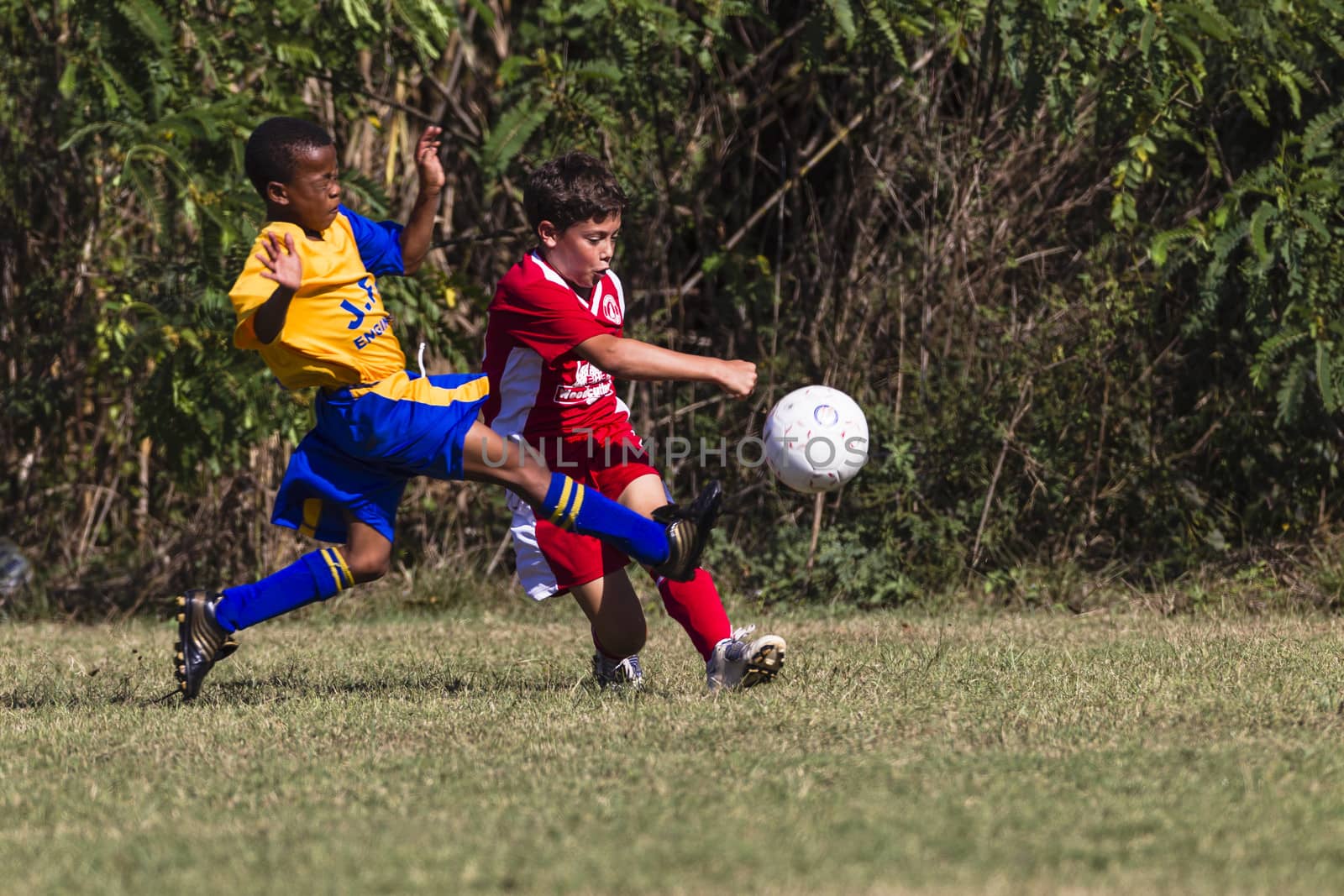 Junior Football Soccer Game by ChrisVanLennepPhoto