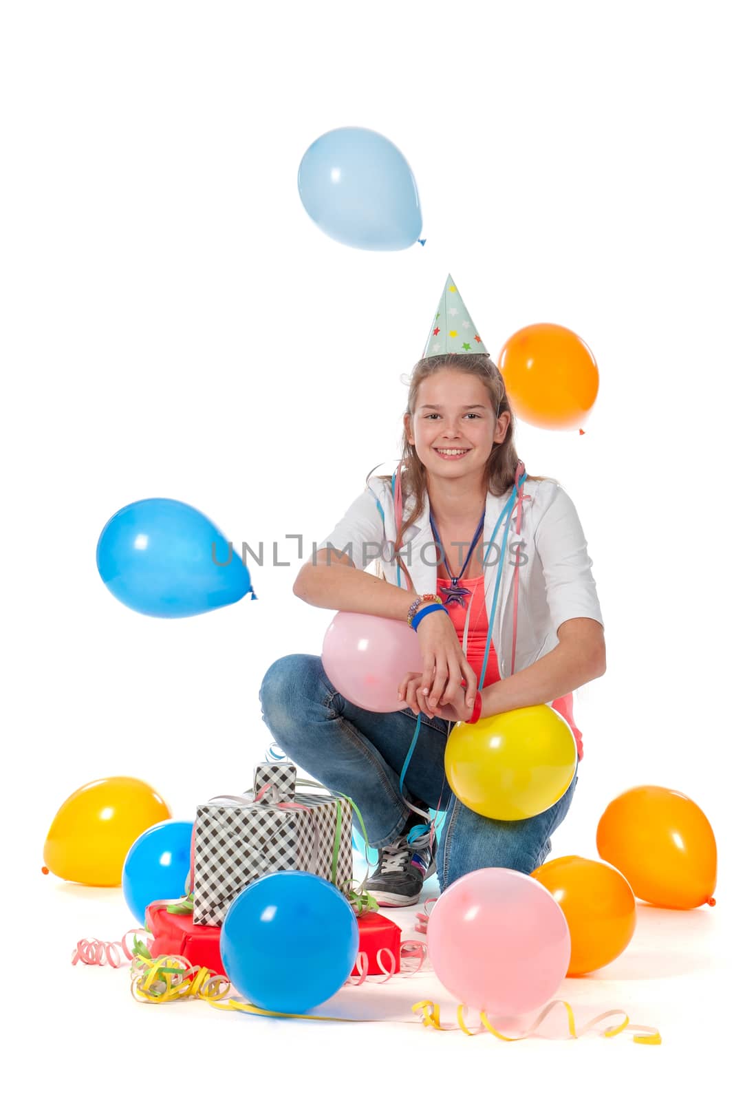 a birthday girl with presents and balloons on a white background