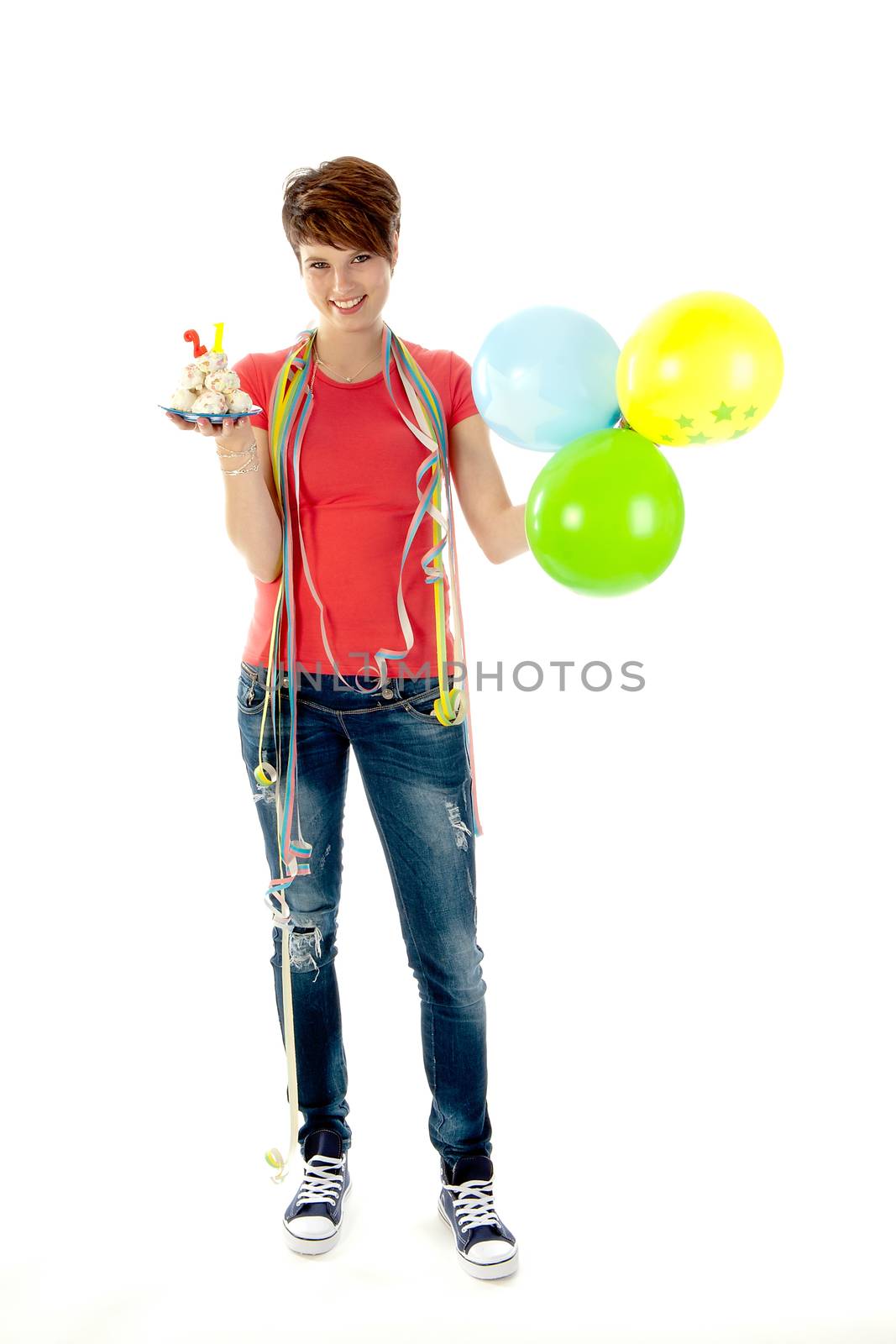 a birthday girl on her 18th birthday, holding a cake with a candle on a white background