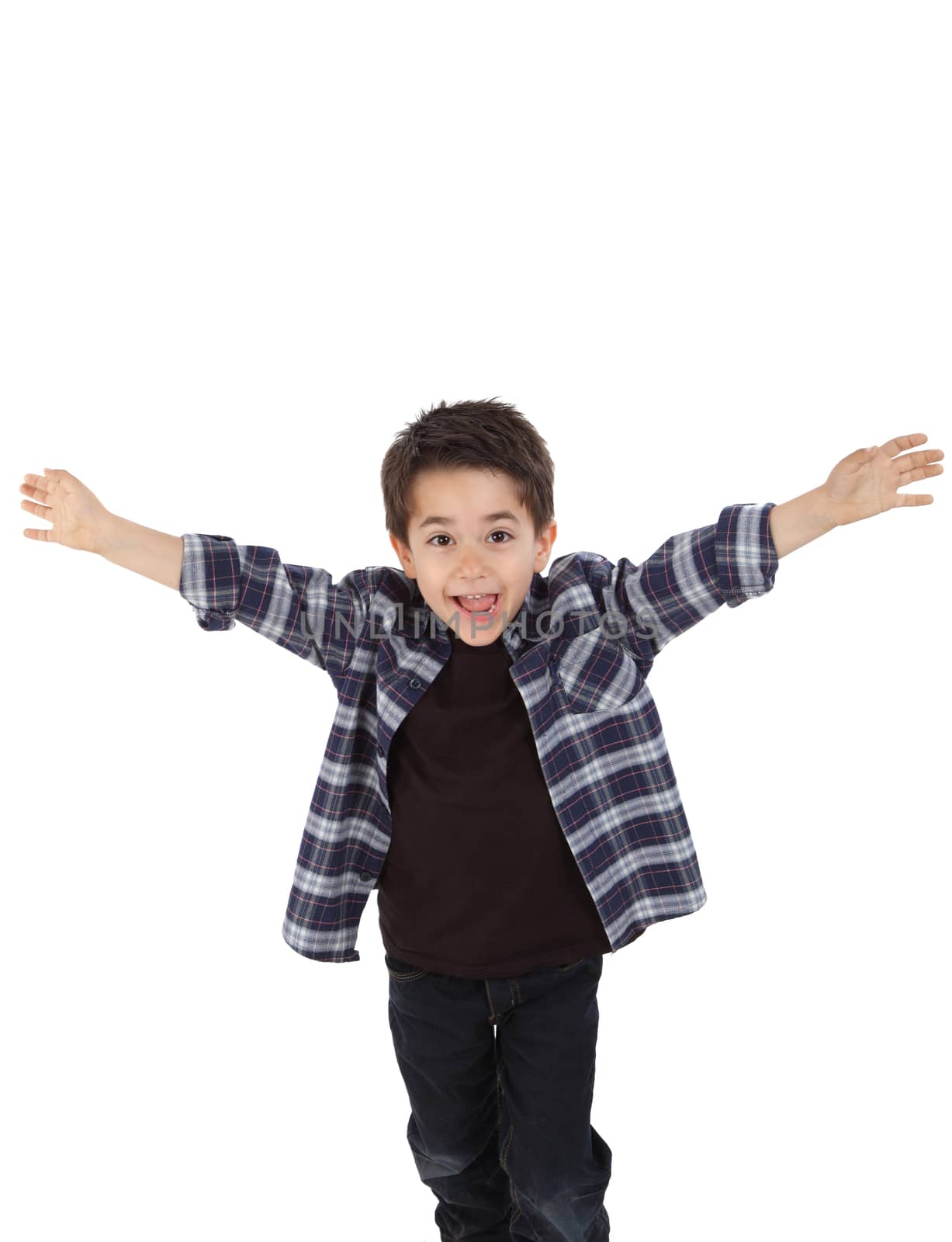 Young boy running happy with open arms