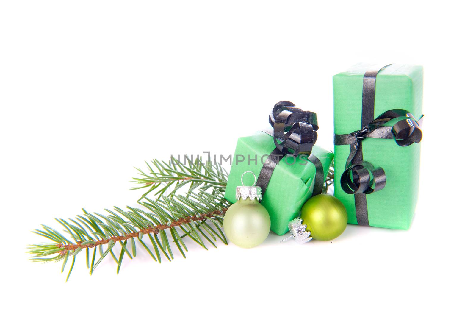 Christmas presents in green on a white background