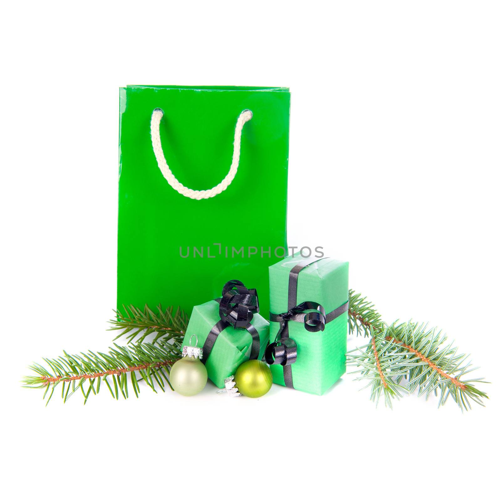 Christmas presents in green on a white background