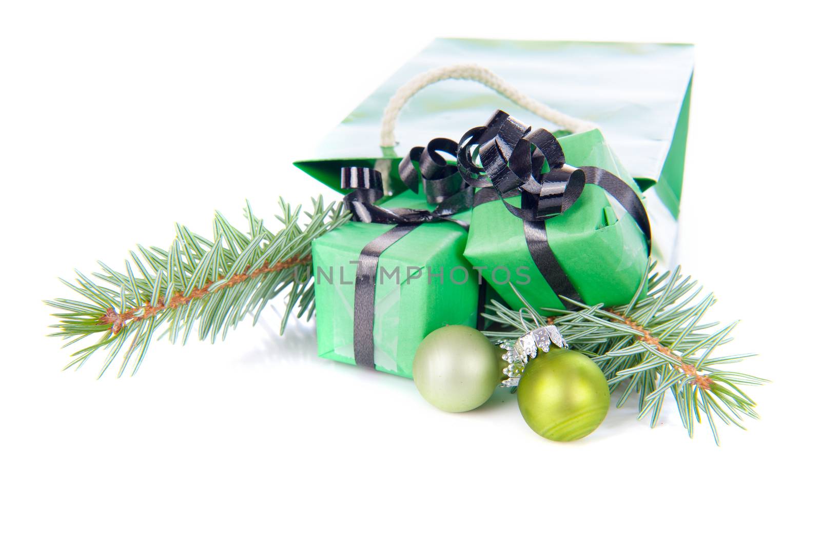 Christmas presents in green on a white background