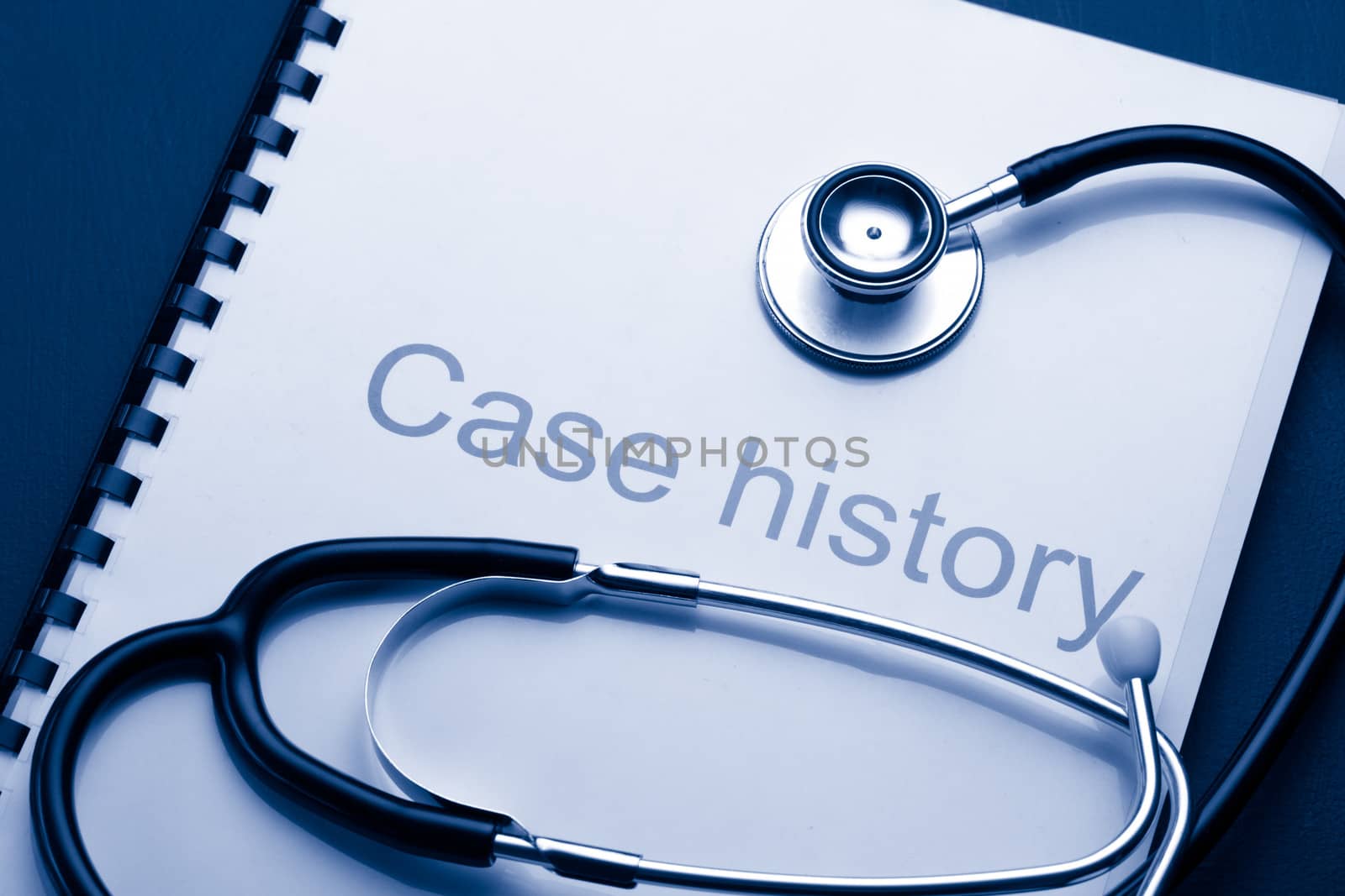 Case history and stethoscope on black by Garsya