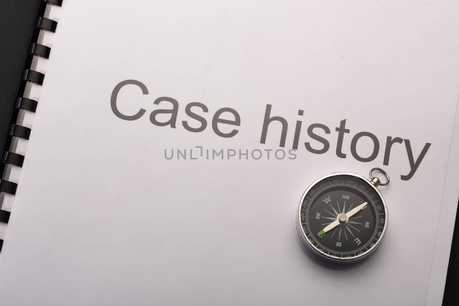 Case history and compass on black by Garsya