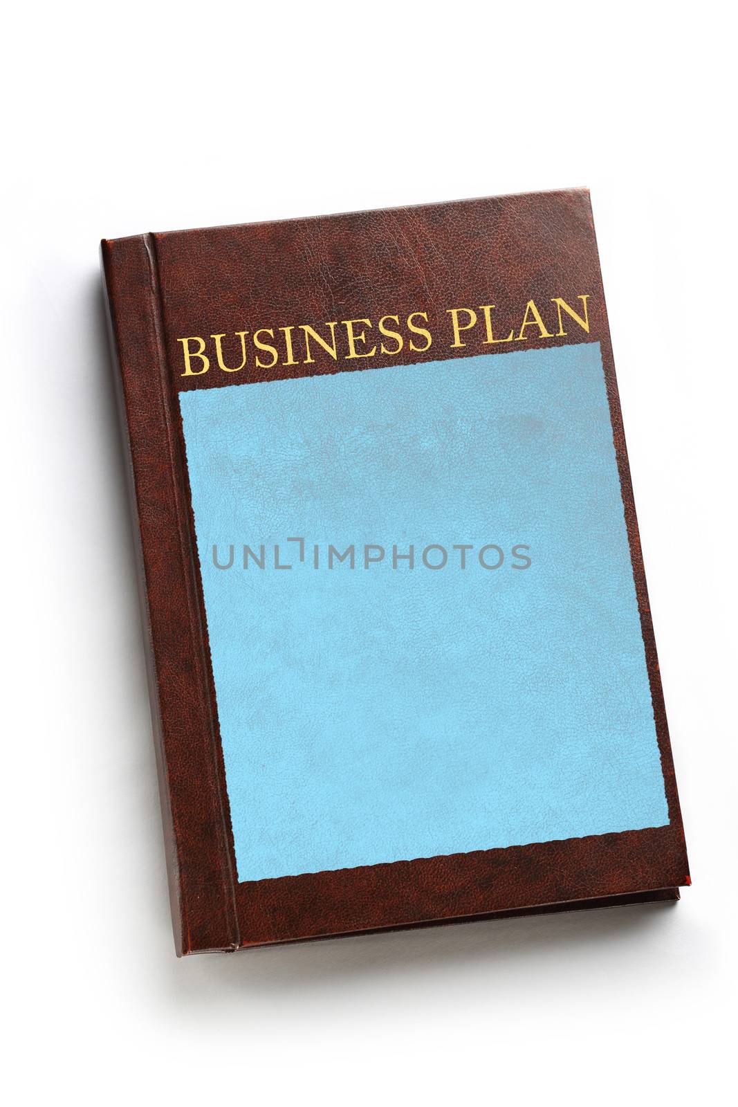 Business plan book on white by Garsya