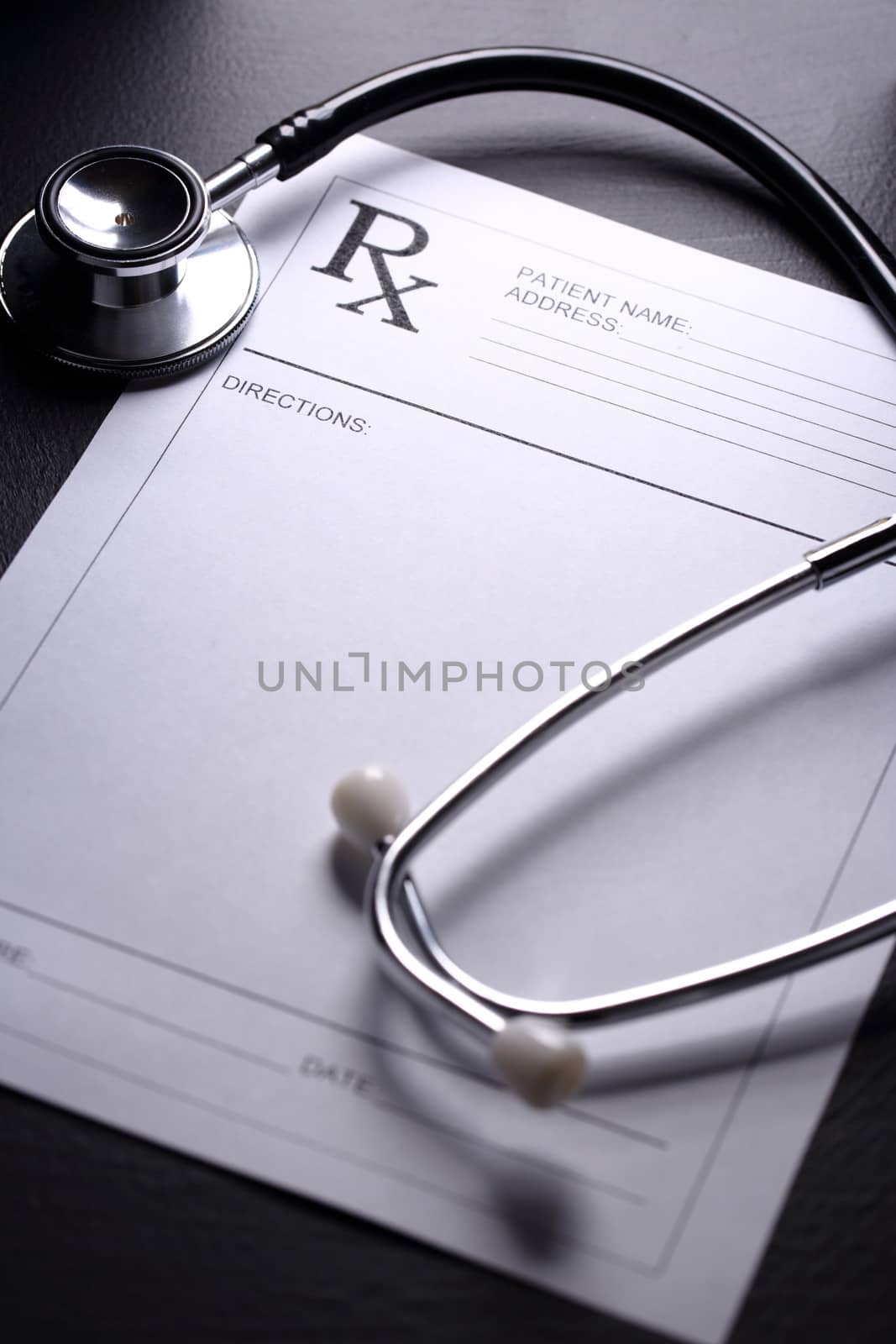 Stethoscope and patient list on black by Garsya