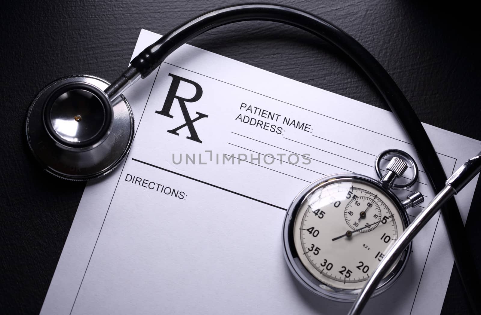 Stethoscope, stopwatch and patient list on black