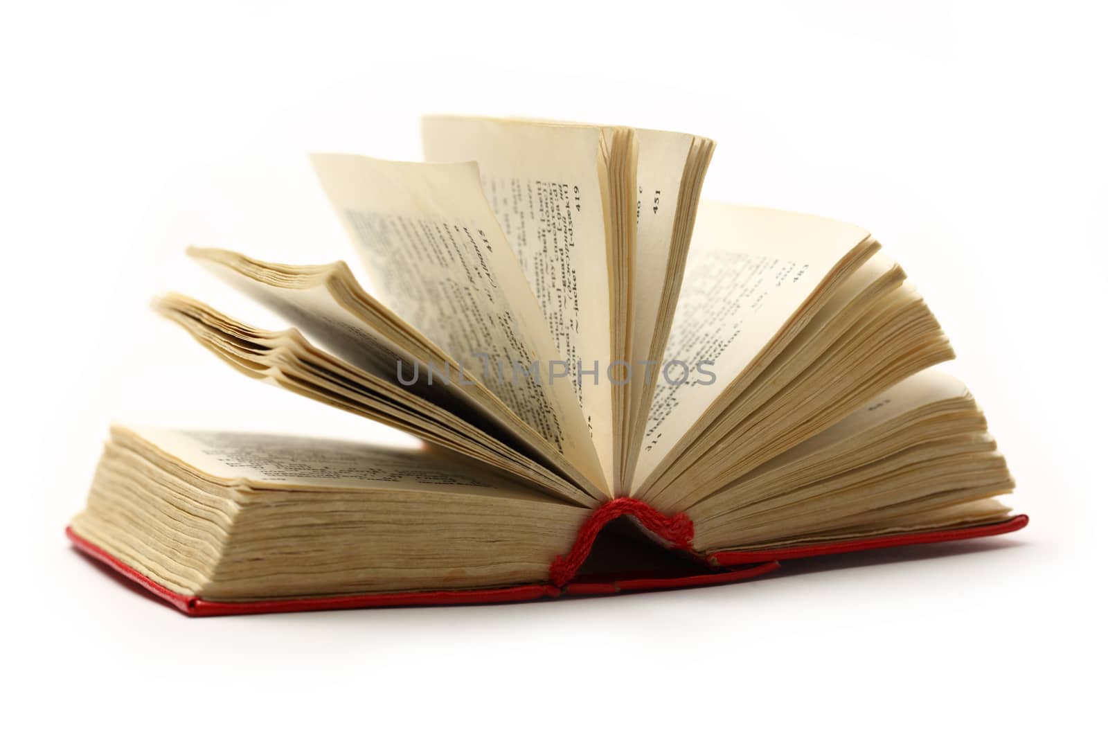 Red open book on white background