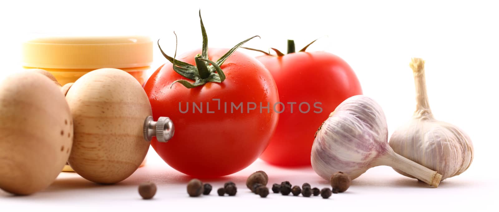 Food ingredients with tomatoes and garlic by Garsya