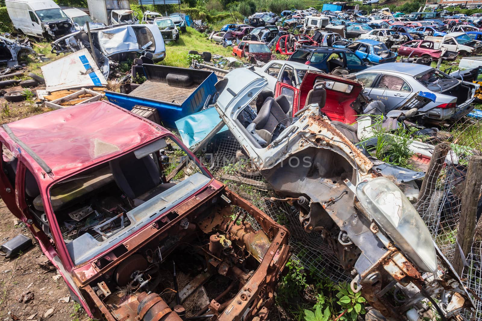 Vehicle scrap yard of destroyed cars from road accidents.