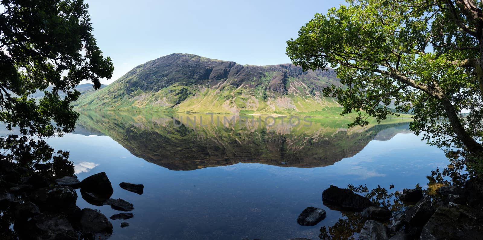 Reflection on Lake District hills in Crummock by steheap