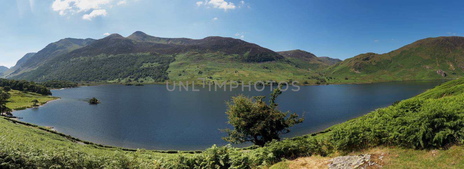 Reflection on Lake District hills in Crummock by steheap