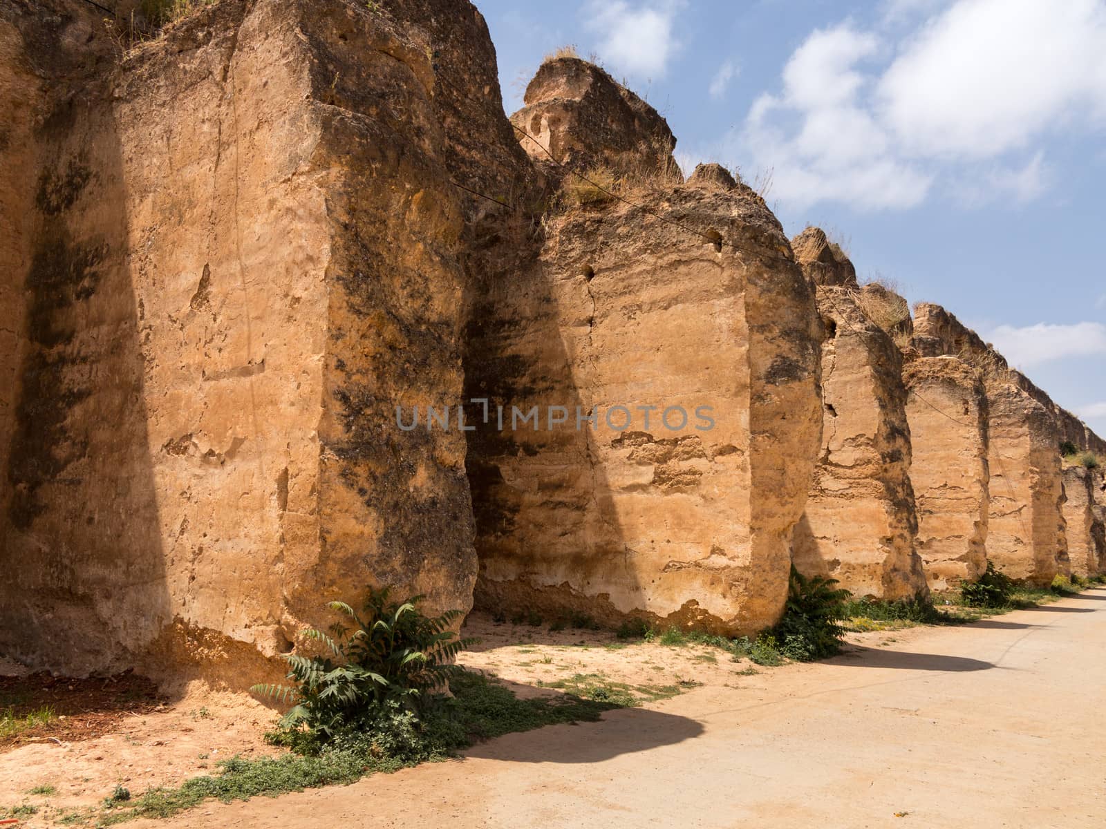 Sahrij Swami ruins in Meknes in Morocco with ancient stables underneath ruined battlements