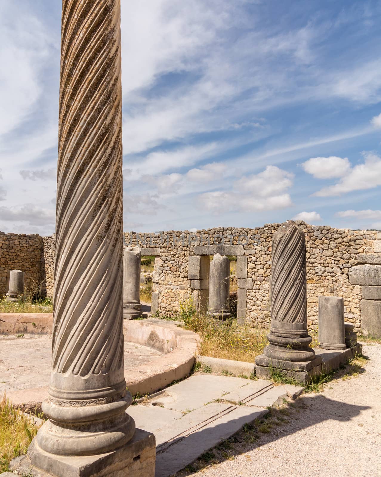 Volubilis is a partly excavated Roman city in Morocco situated near Meknes between Fes and Rabat. Built in a fertile agricultural area, it was developed from the 3rd century BC onwards as a Phoenician Carthaginian settlement