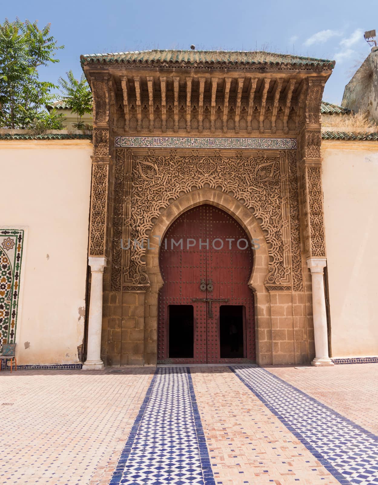 Large wooden doors in archway  as entrance to Dar El Makhzen palace, located in El Mechouar Stinia. It was Moulay Isma��l official palace