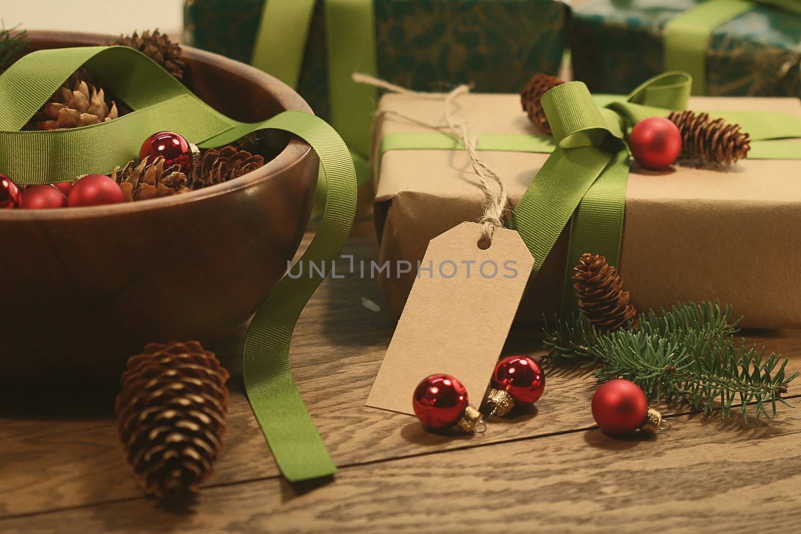 Gift with tag for the holidays on wood table