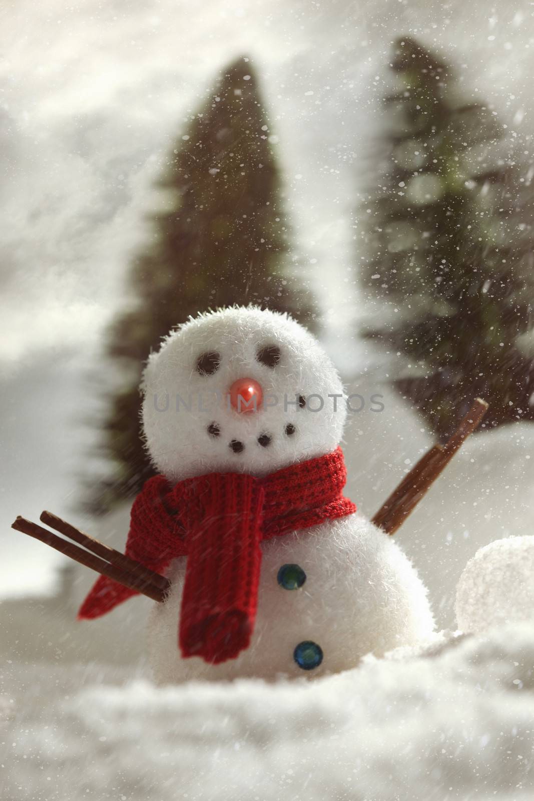 Little snowman with winter snow background