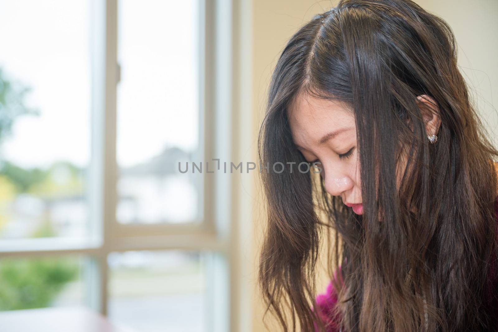 Sad young woman looking depressed