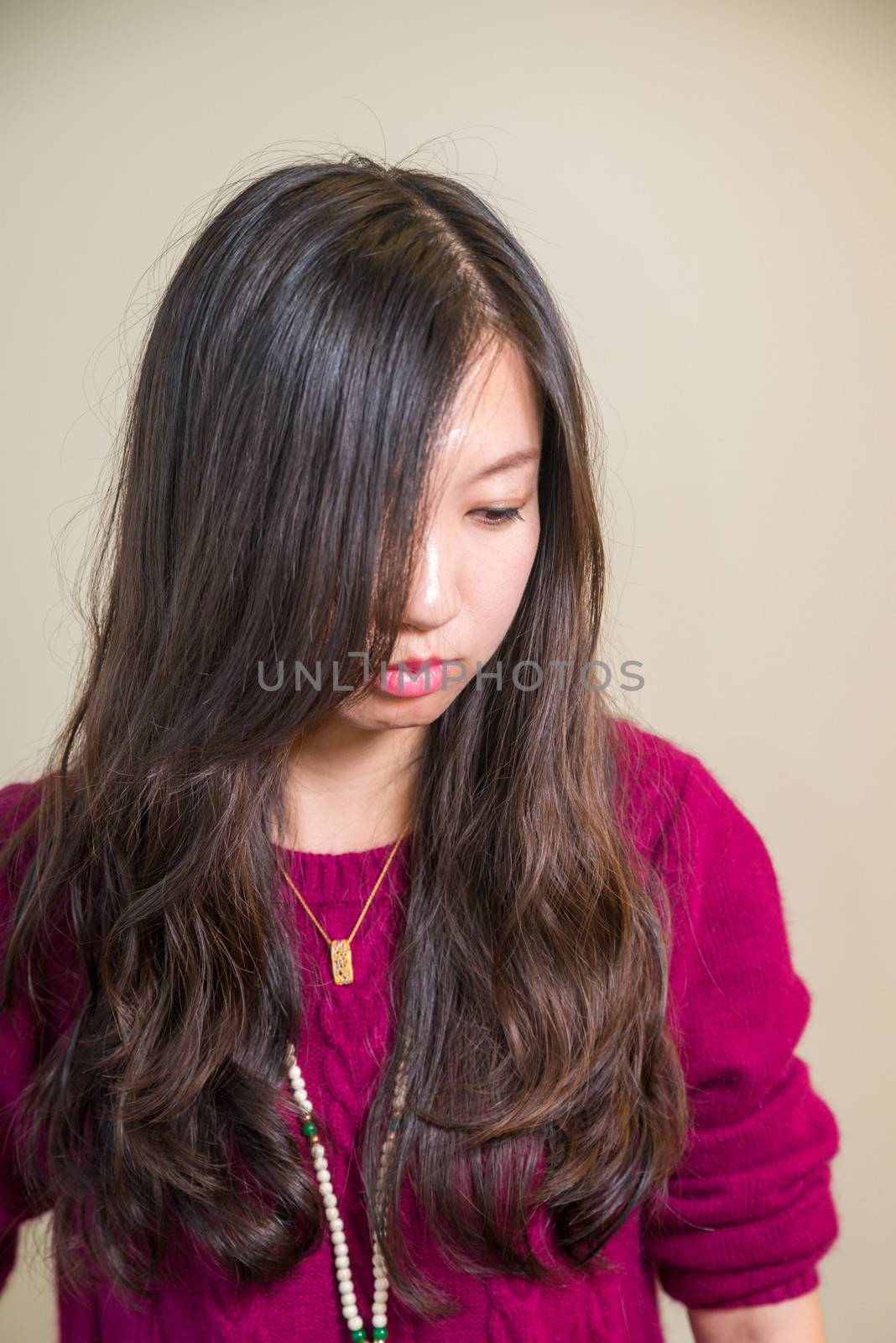 Portrait of young woman looking stressed out