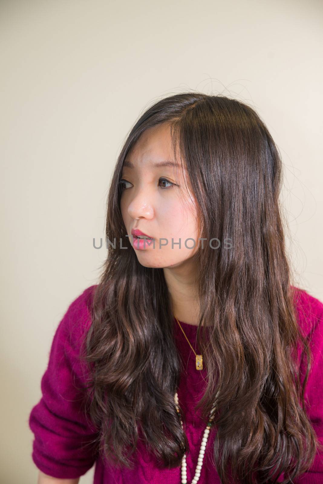 Portrait of young woman looking stressed out